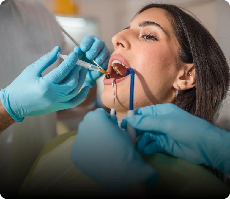 Patient receiving dental treatment