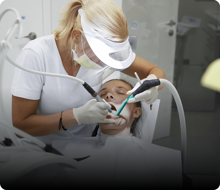 Woman receiving dental treatment
